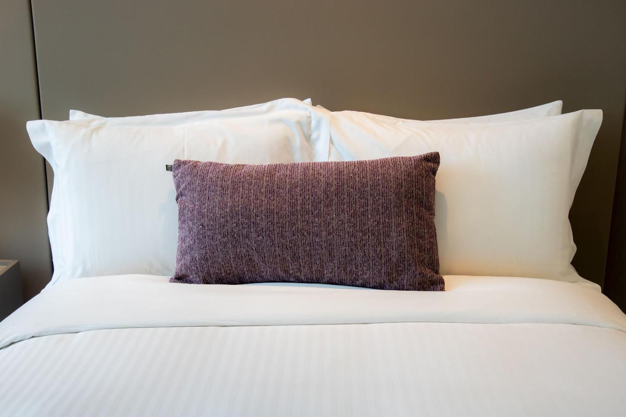 Camino Real Fashion Drive Monterrey Hotel San Pedro Garza Garcia Exterior foto A bed with pillows